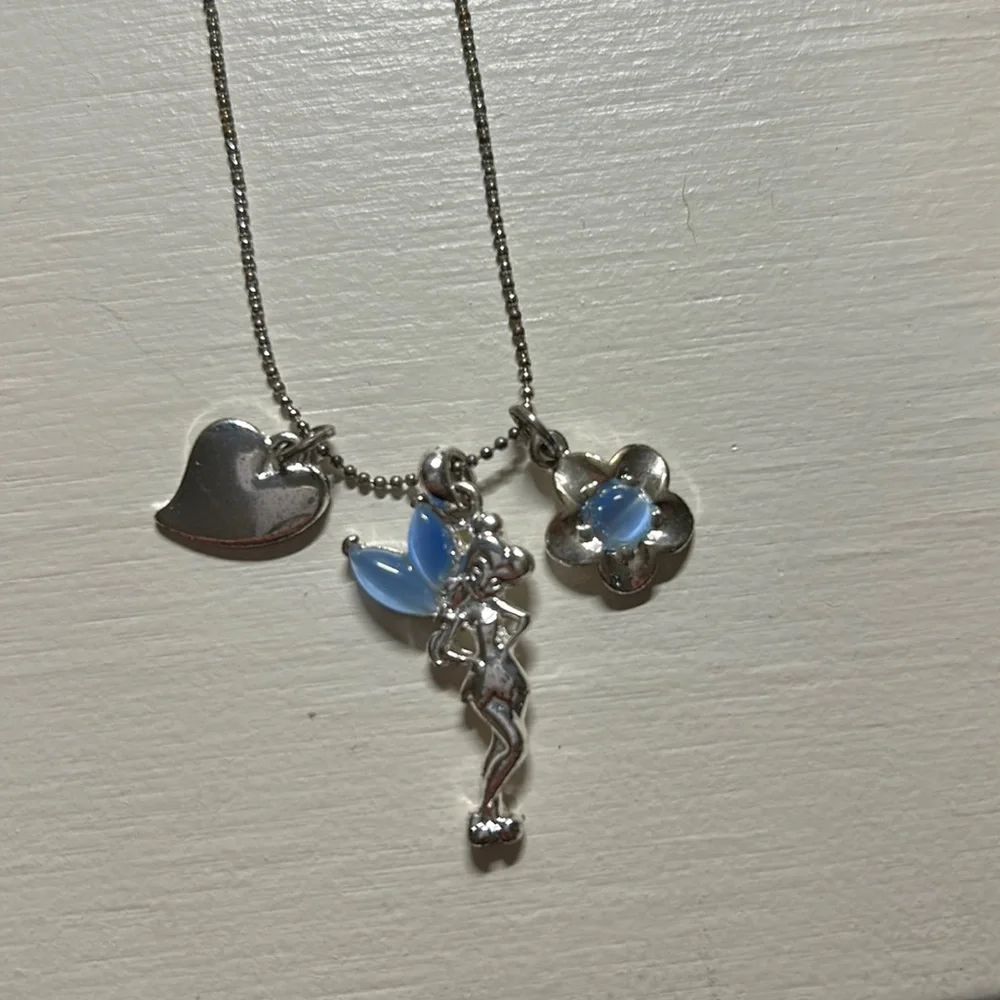 Kids 16” silver lobster clasp. Has tinker bell charm. Gently used